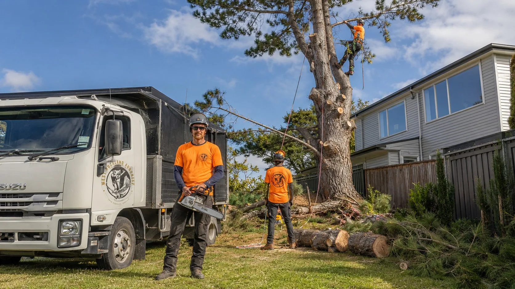 West Auckland Arborist crew and truck on a residential tree removal job